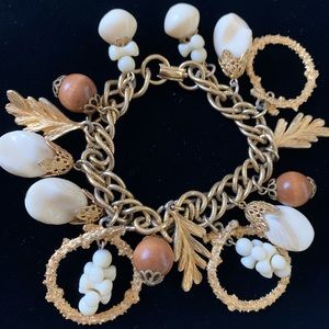 Charm bracelet with different kind of textures charms